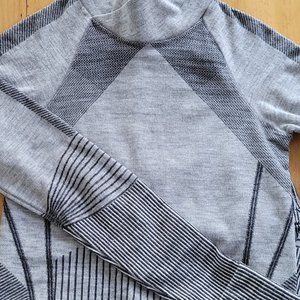 Long sleeve grey Athleta top with higher neck